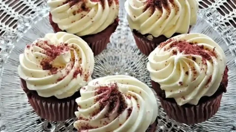 Creamy 3 Ingredient Cream Cheese Frosting in a mixing bowl, ready to spread on cakes and cupcakes.